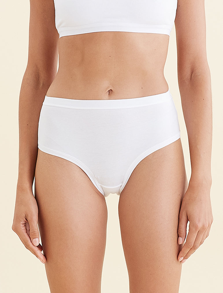 Mid rise, bikini cut style panty with exposed elastic waistband